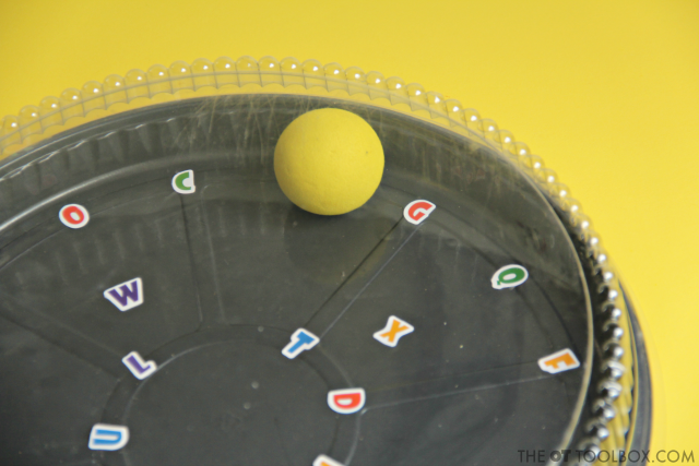 Kids can use a recycled cake pan to work on hand-eye coordination and visual motor skills needed for reading, writing, and many other functional skills in occupational therapy activities. Kids can use a recycled cake pan to work on hand-eye coordination and visual motor skills needed for reading, writing, and many other functional skills in occupational therapy activities.