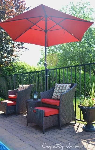 Red Market Umbrella and chairs poolside