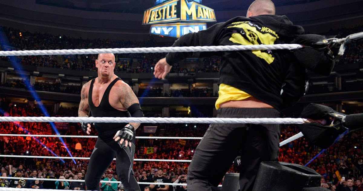 Андертейкер рестлмания. Undertaker randy orton. Wwe 2013. Undertaker chokeslam гифка. Abyss chokeslam.