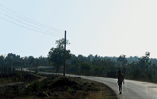 boy on country road in India