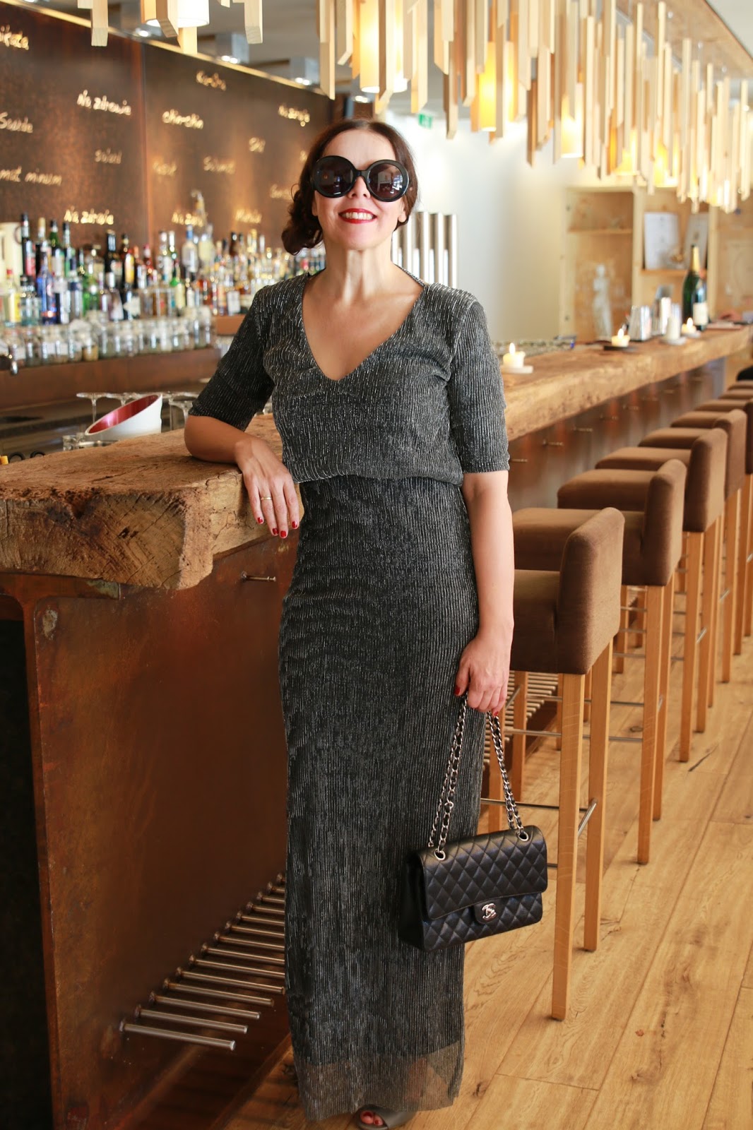 New Years Eve look, silver maxi dress, shoes with fringes, black Chanel 2.55