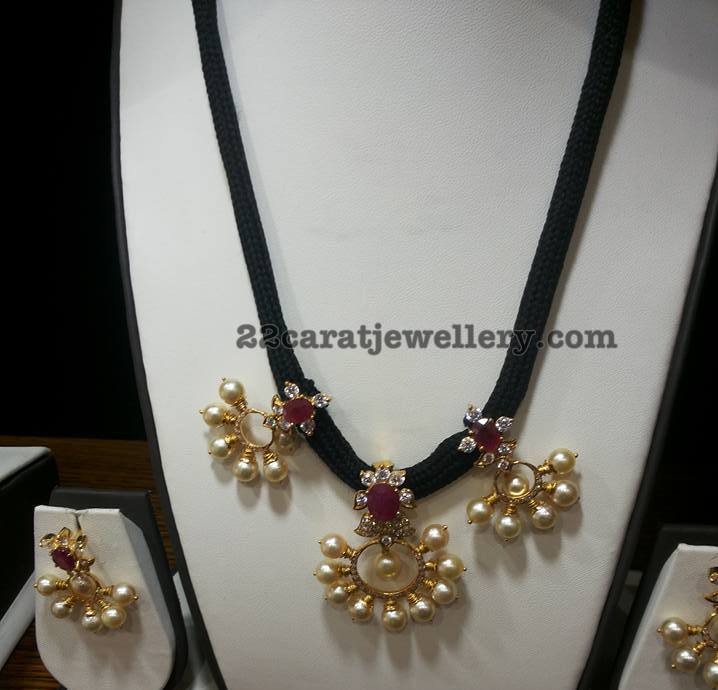 Pearls Adorned Black Cord Set Jewellery Designs