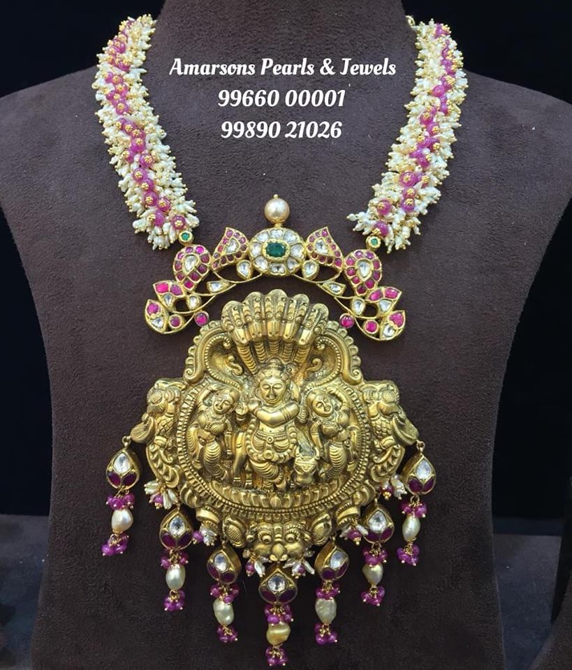 Adorable Krishna Pendant with Rice Pearls Jewellery Designs