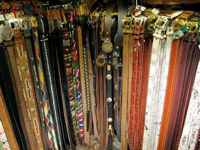Belts of all colors and sizes, of course made out of leather at Native Leather in New York City