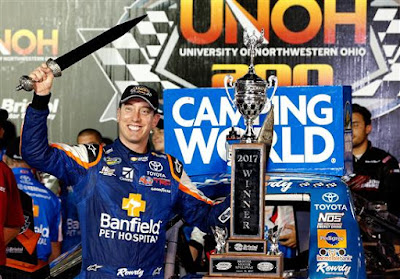Kyle Busch Celebrates In Victory Lane with the Winner’s Trophy - #NASCAR Kyle Busch Celebrates In Victory Lane with the Winner’s Trophy - #NASCAR