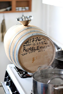 Cleaning the five gallon barrel with near boiling water.