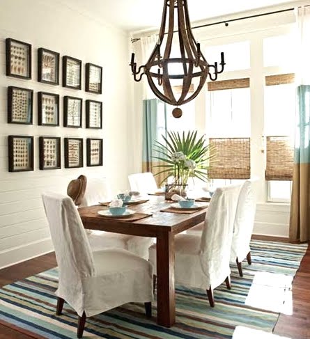 gallery wall with shell art in dining room