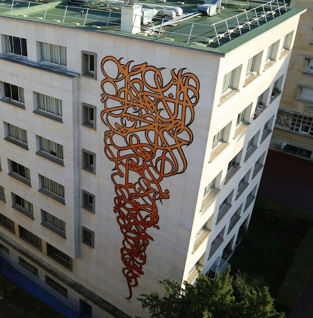 Calligraphy Street Art By Franco-Tunisian artist eL Seed at the Maison De Tunisie in Paris, France. 1