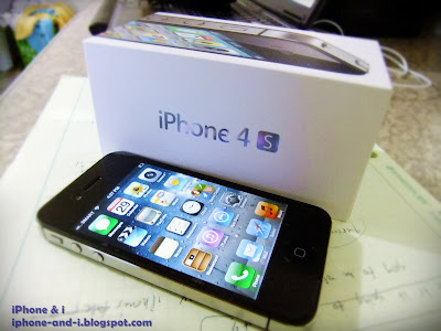 Unboxing the new iPhone 4S.