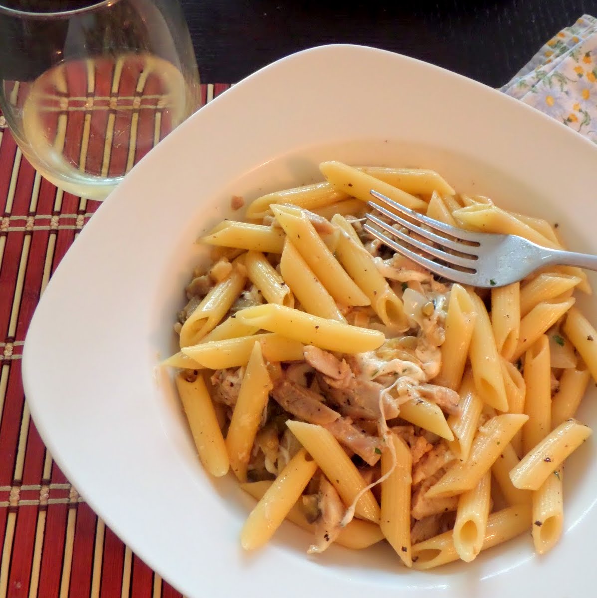 Cheesy Chicken Garlic Penne:  Penne with chicken, garlic, and cheese in a white wine sauce