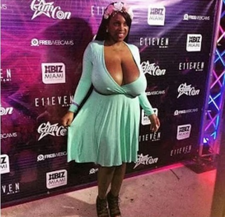 Lady With Massive Boobs Causes A Stir In Pubic After Appearing In A Very Revealing Dress Photo Lady With Massive Boobs Causes A Stir In Pubic After Appearing In A Very Revealing Dress Photo