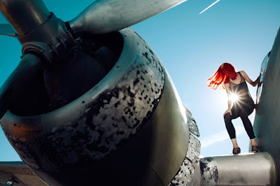 woman near airplane wing, fashion shoot in airport, jamie nelson photographer
