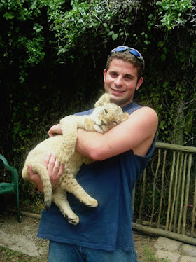 Drew with a brand new lion cub.