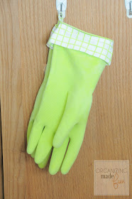 Loop on rubber gloves to hang dry :: OrganizingMadeFun.com
