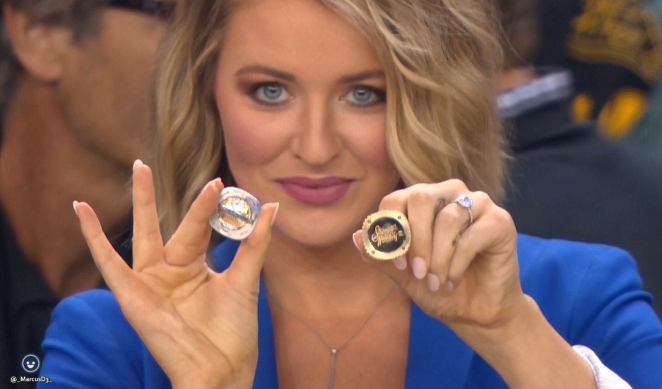 Kristen Ledlow with Steph. curry championship rings. 