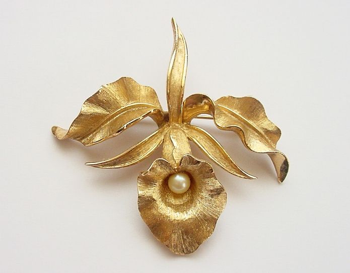 малазийская золотая орхидея. орхидея филигрань. золотая орхидея на черном фоне. золотые серьги золотая орхидея с-001к549. орхидея гальванопластика.