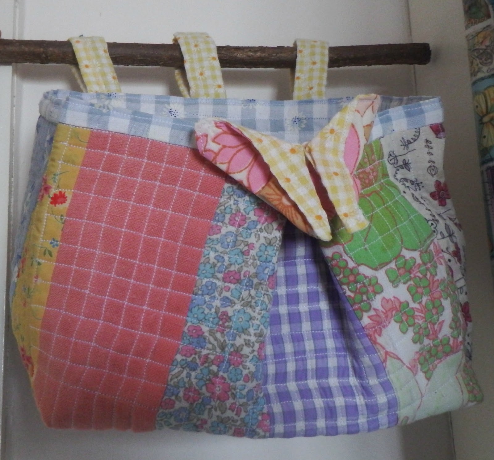 Wonky Patchwork Small, hanging, patchwork fabric basket.