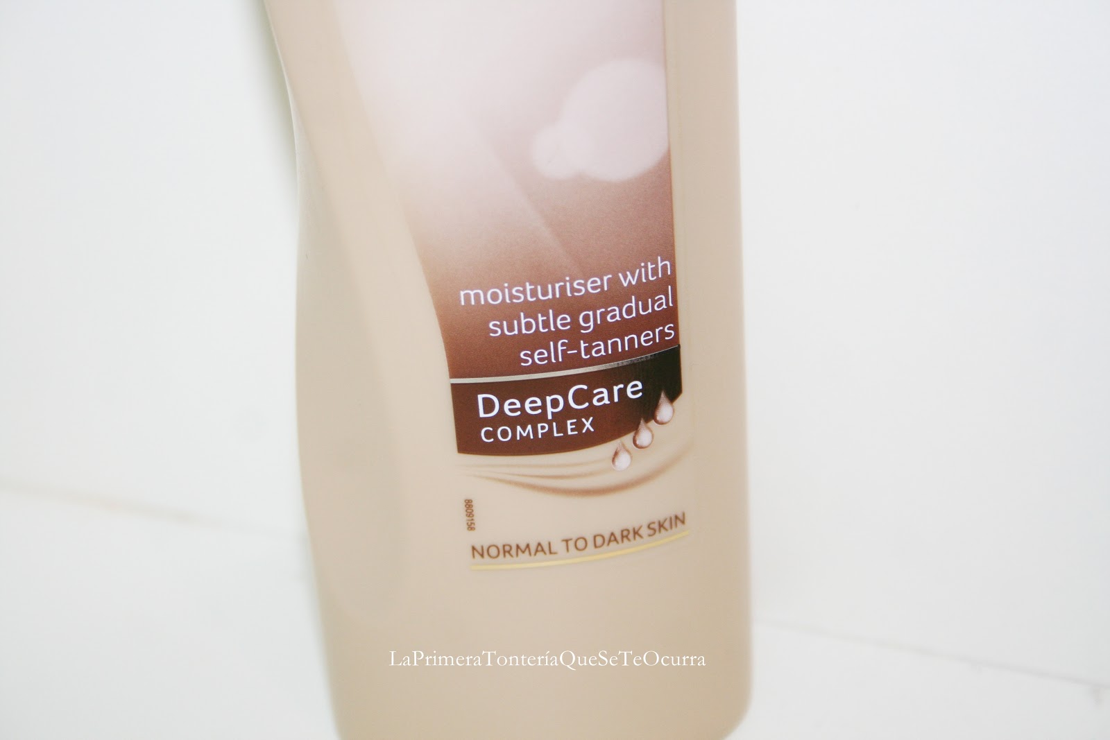 crema bronceadora dove