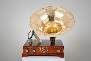 Looks like a gramophone player for an iPhone or iPad. 