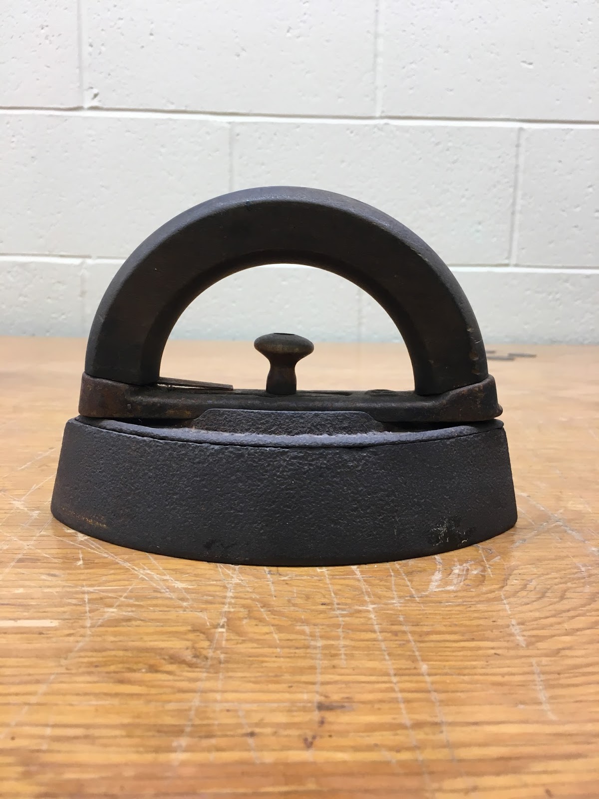 100 Hidden Histories Ironing Sad or Sad Iron?