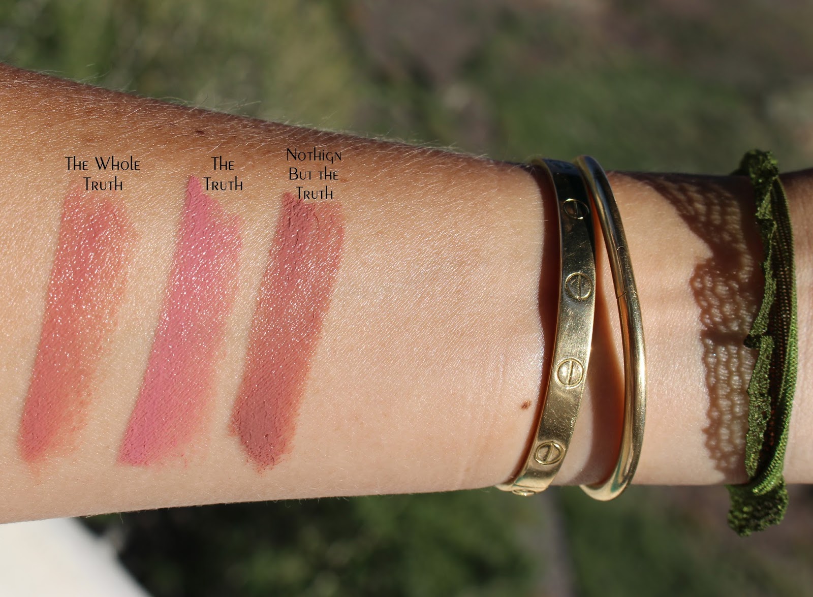 Lipstick Queen Nothing But the Nudes Lipstick swatches.