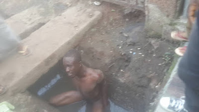 Man Stripped Unclad And Beaten Mercilessly After He Was Caught Stealing In Owerri. Photos Guil
