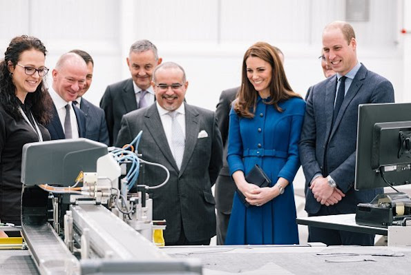 Visit to McLaren, the Duchess wore a blue dress by Eponine, and Rupert Sanderson Malory pumps, a clutch bag by Smythson
