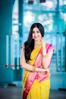 Actress Adah Sharma Exclusive Poshoot in Beautiful Yellow Silk Saree at Saree Niketan Showroom Launch  0001