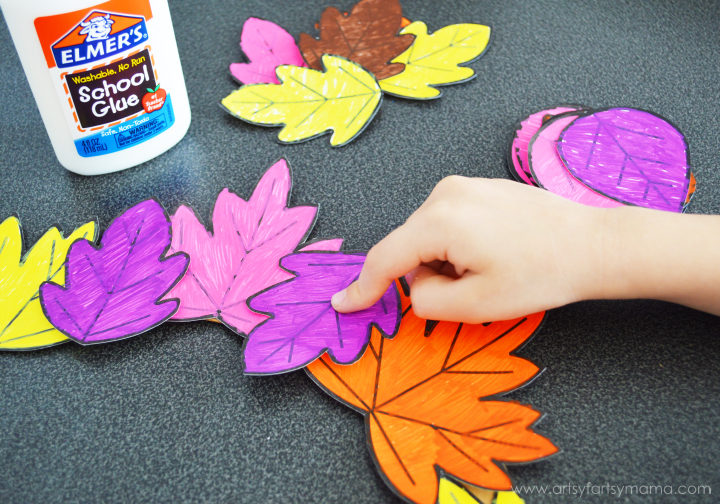 Kids DIY Autumn Leaf Wreath at artsyfartsymama.com #fall #kidscraft #Elmers