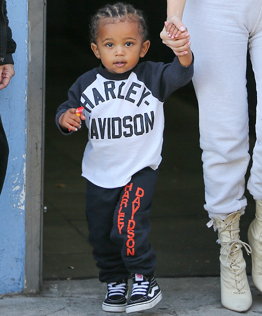 Saint West is beginning to look so much like his dad, Kanye West (photos)