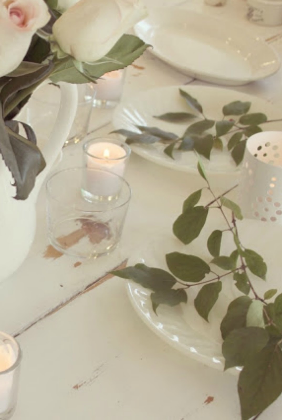 Romantic shabby chic French farmhouse tablescape on white farm table with roses by Hello Lovely Studio