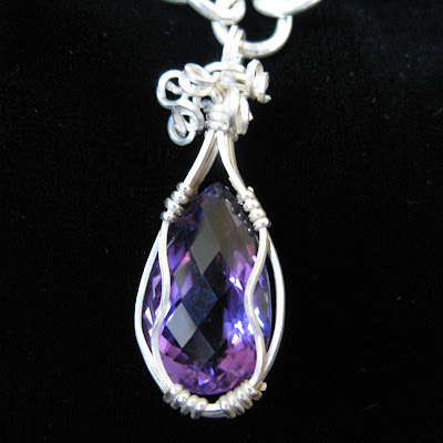 Pear-shaped Amethyst pendant custom set with Argentium wire