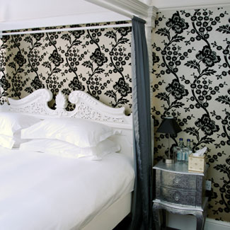 Interior Bedroom decorating with damask wallpaper designs