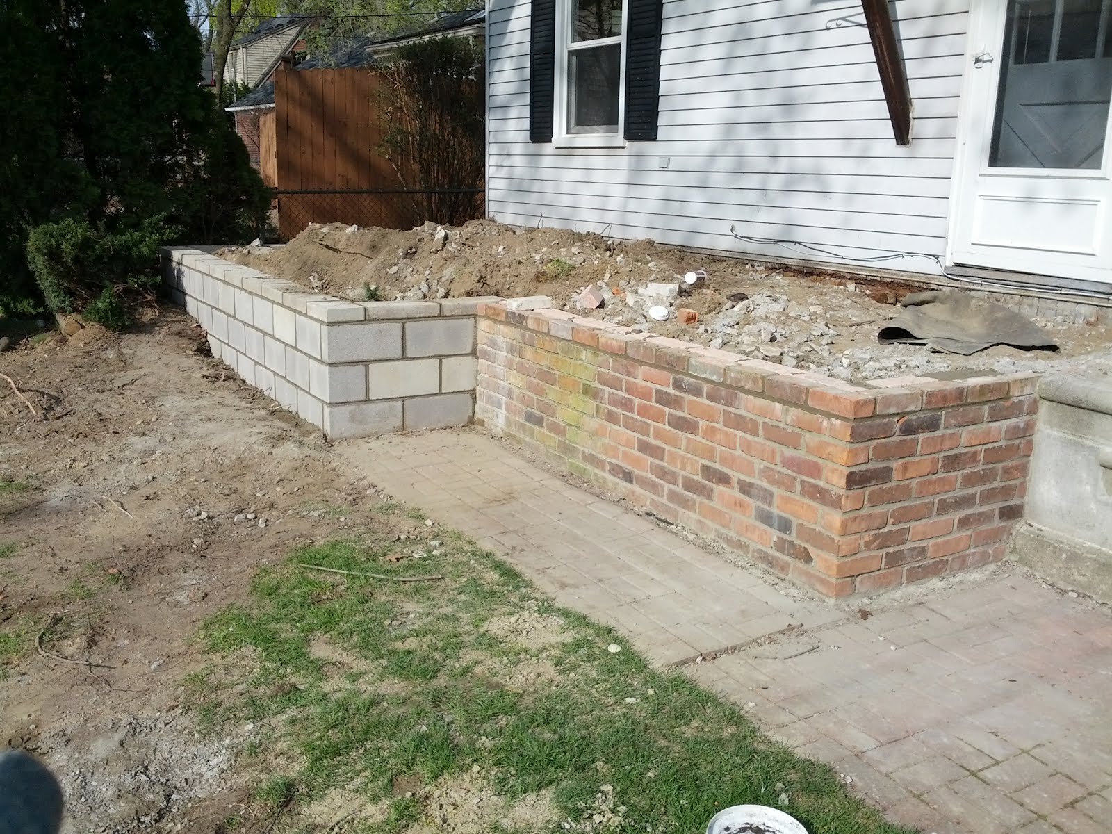 !TOP VALUE CONSTRUCTION LLC! Porch footing and block