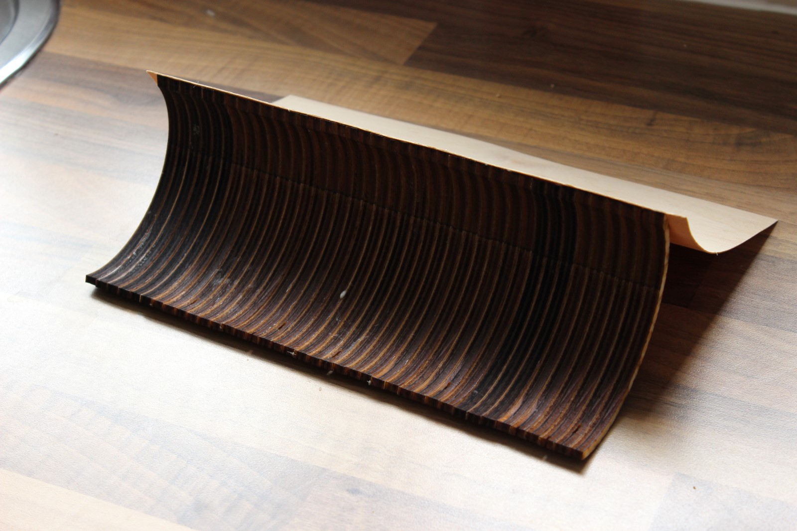 Gluing curved surfaces