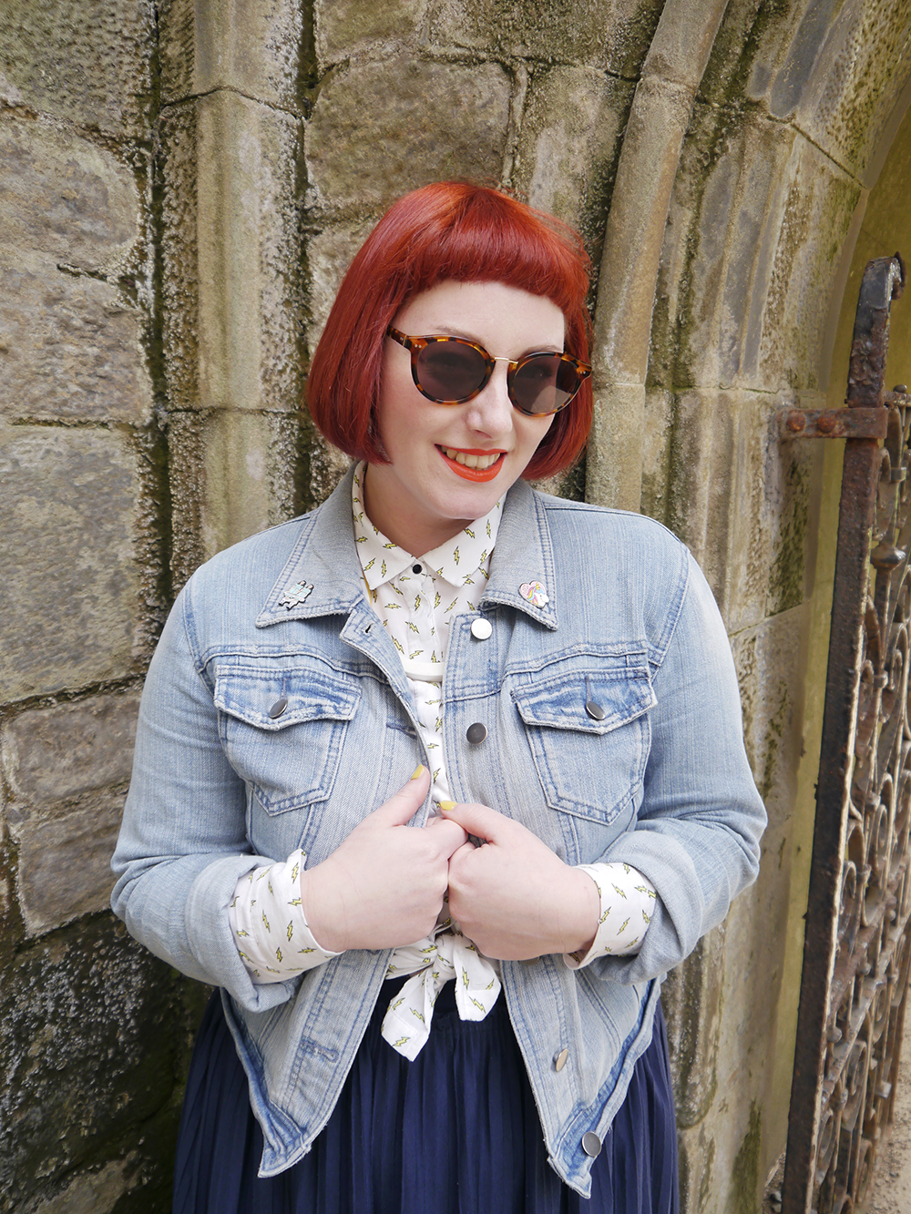 Celebratin Scottish summer with Iolla Murray Sunglasses Scottish blogger, red head, Scottish street style, fun street style, colourful street style, colourful blogger, colourful outfit, red bob, ginger bob, sunlglasses style, #seewithiolla, iolla, Beth lamont necklace, yellow accessories, lightning bolt shirt, patterned shirt, denim jacket, yellow nails, Scottish summer, Murray sunglasses, tortoise shell sunglasses