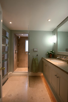 Limestone shower and steam room with vanity top  