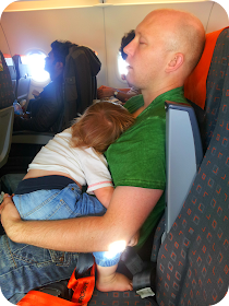 baby asleep on plane, baby on airplane