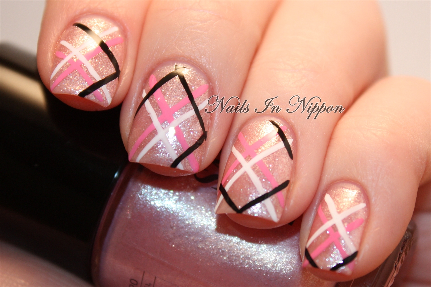 6. Pink and Gold Striped Nail Art - wide 9