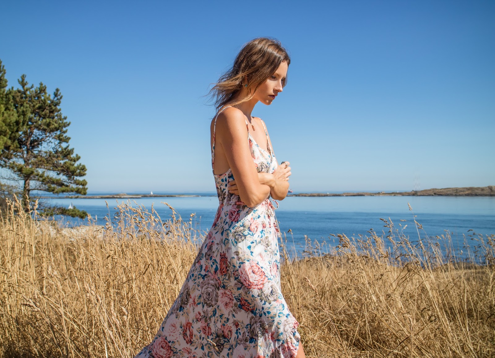 Fashion blogger, Alison Hutchinson, is wearing an Auguste Dress in Victoria, BC, Canada