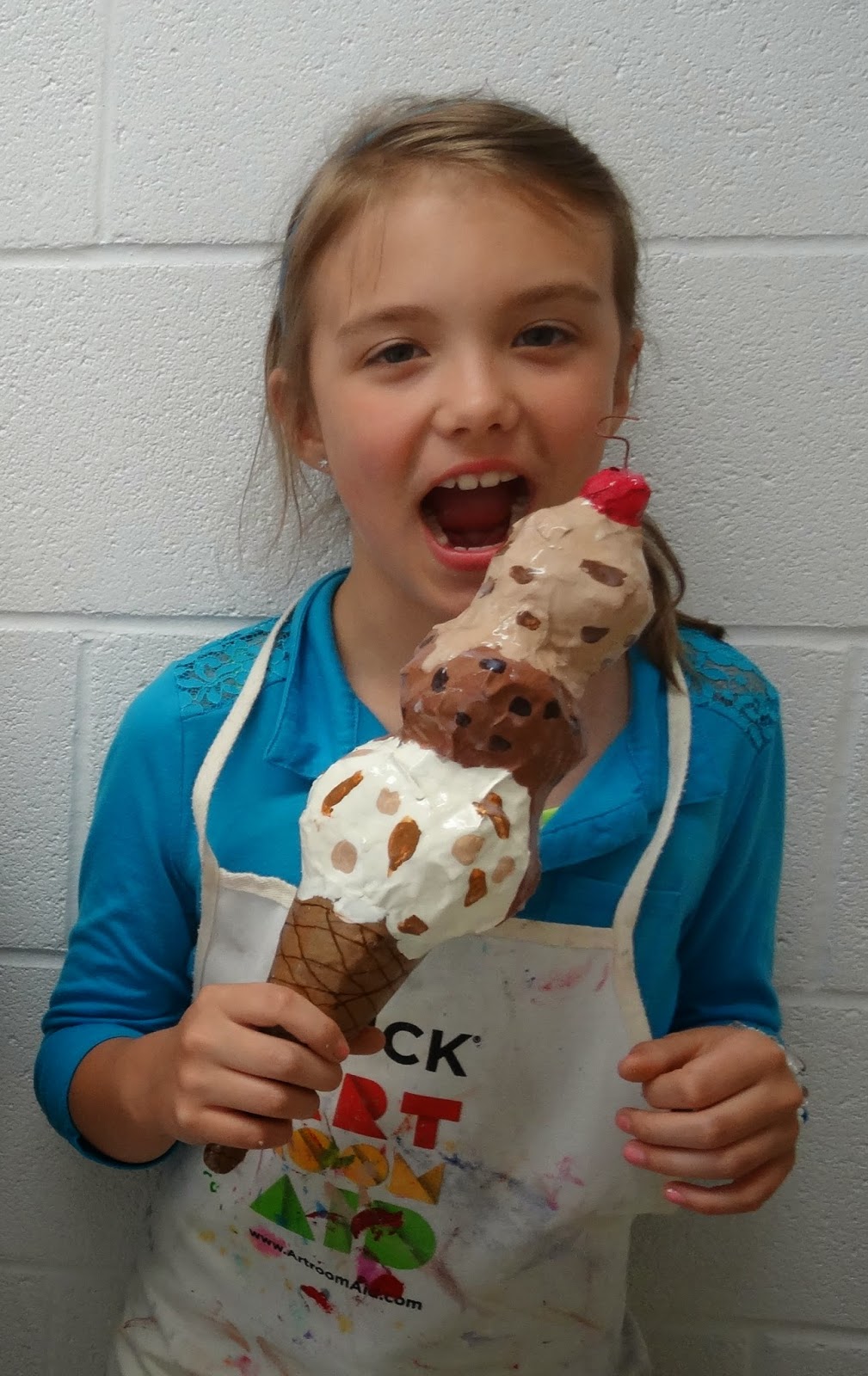 Paper mache ice cream cones made by kids. - ARTBAR