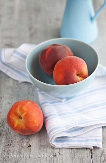 Fresh summer peaches in a bowl