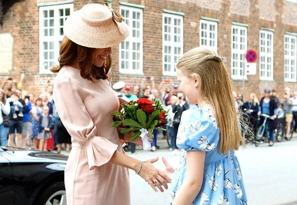 Princess Marie wore Goat Fashion Gaynor pencil dress. Princess Marie wore a pink bell sleeves pencil dress by Goat Fashion