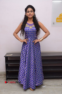 Actress Nitya Naresh Stills in Long Dress at Nandini Nursing Home Platinum Disc Function  0443