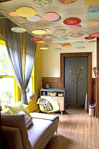 love the look of this floating embroidery hoop art display - what a unique decoration!