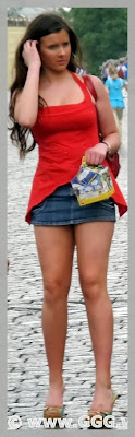 Girl in denim mini skirt on the street