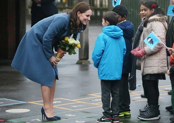 Kate Middleton wore Sportmax coat from Pre Fall 2014 collection and Seraphine royal blue tailored maternity dress