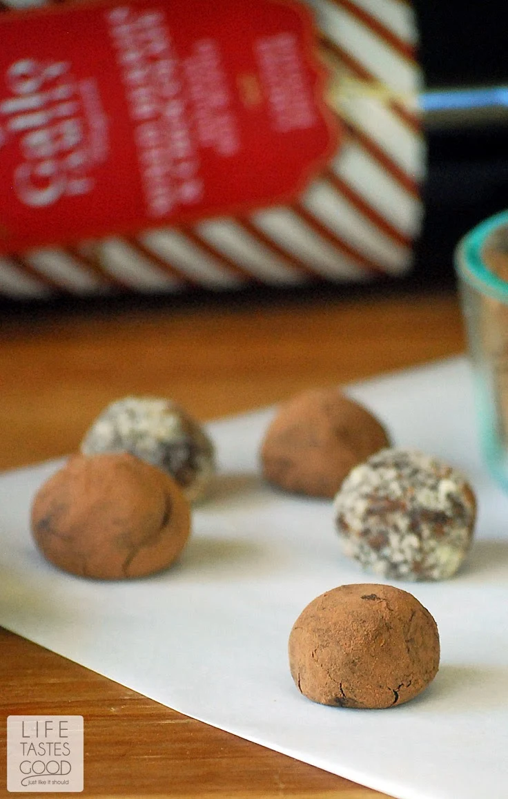 Red Wine Chocolate Truffles | by Life Tastes Good are bite sized pieces of chocolate heaven. These are traditional French Truffles made with a simple chocolate ganache I flavored with red wine and rolled in cocoa powder. #SundaySupper