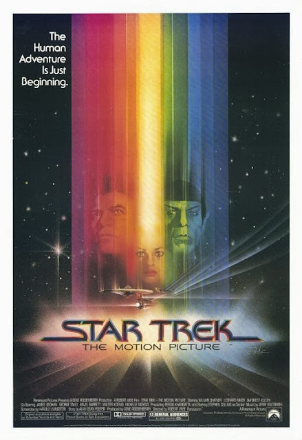 Movie Poster for Star Trek: The Motion Picture.  My earliest memory of a comic book is this image on the back cover.
