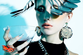 beauty photographer LA, moder drinking cocktail, woman eating maggot, silverware accessories